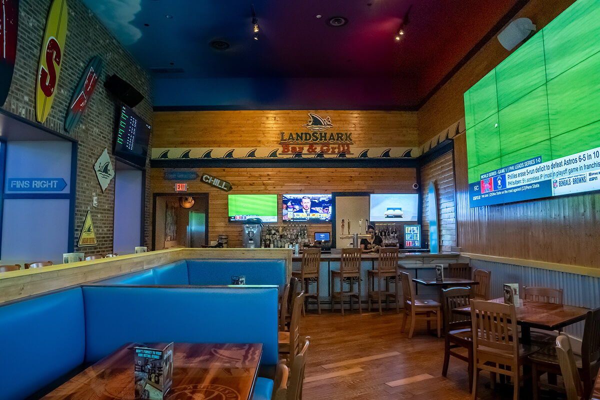 Fins Up interior with wooden chairs and tables